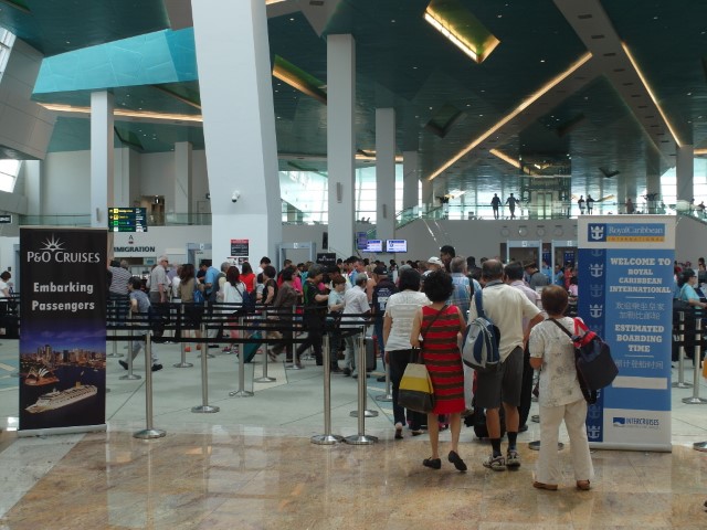 Queue to clear immigration inside Marina Bay Cruise Centre