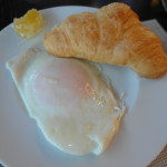 Beautiful sunny side up with croissant