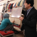 Live demonstration of the weaving process of a Turkish Carpet