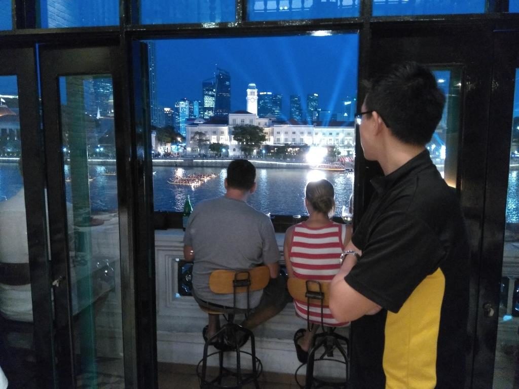 Many guests of Panorama Free Flow Fridays enjoying panoramic views of the Singapore River