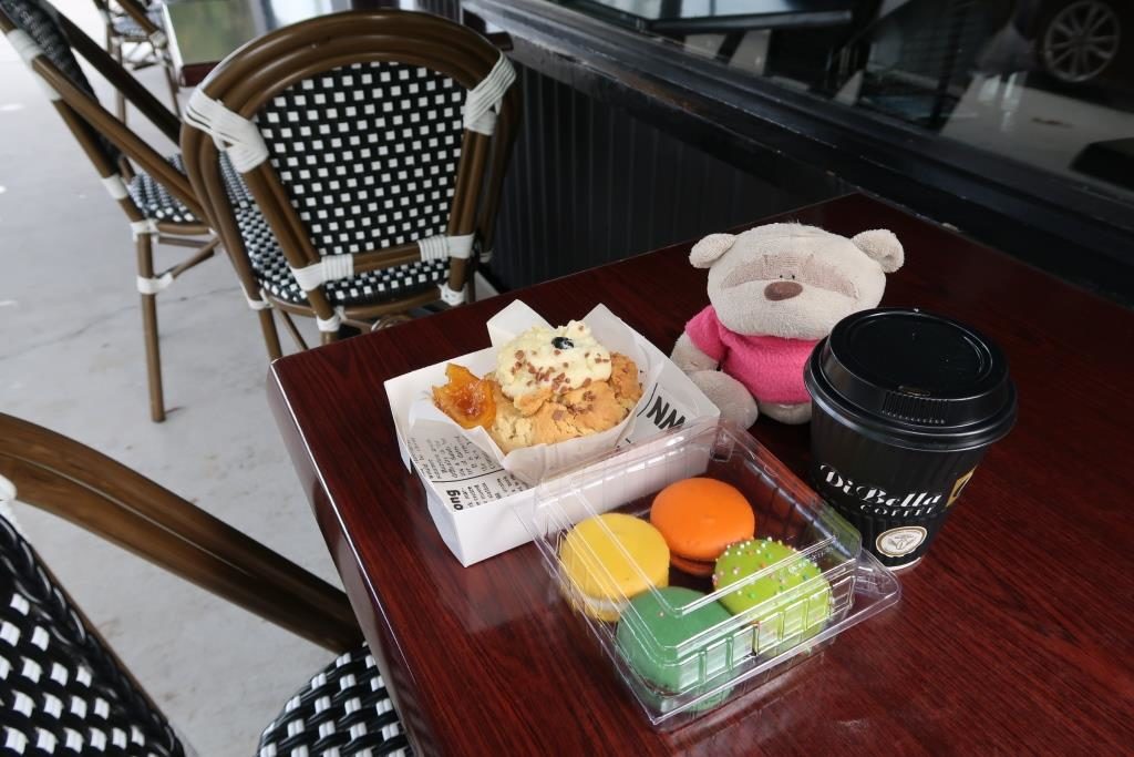 Orange dotted Muffin with delightful macarons and coffee from Marche du Macaron Brisbane - Total Damage of $27.5
