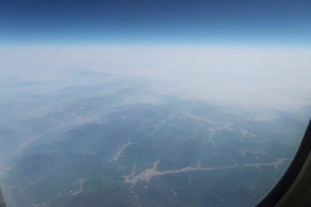Mountainous landscape of Busan from plane