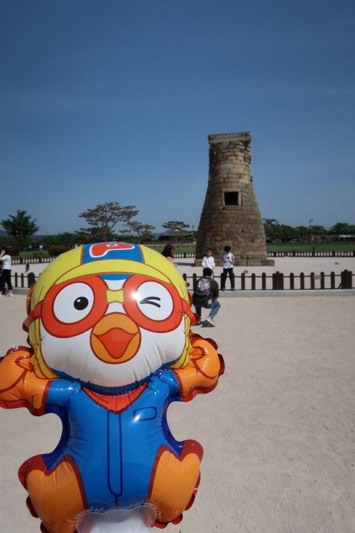 Pororo, our guide in Gyeongju with Cheomseongdae in background