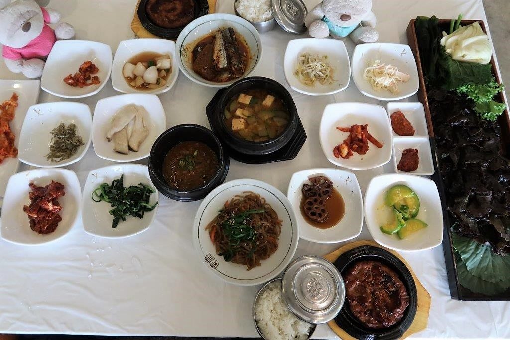 Traditional Shilla Lunch with loads of small dishes and fresh vegetables