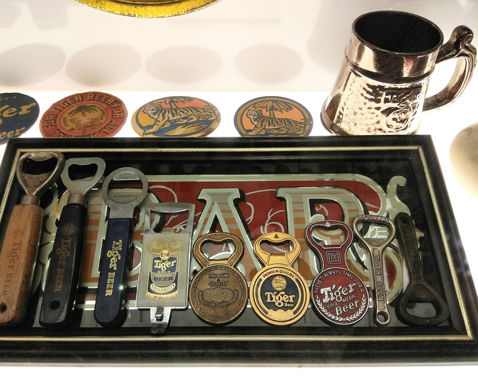 Various Tiger Beer Bottle Openers through the years
