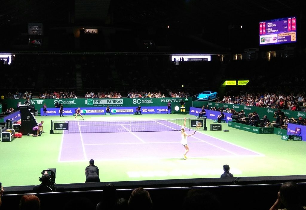 Elina Svitolina serving against Petra Kvitova during session 1 of WTA Finals Singapore 2018