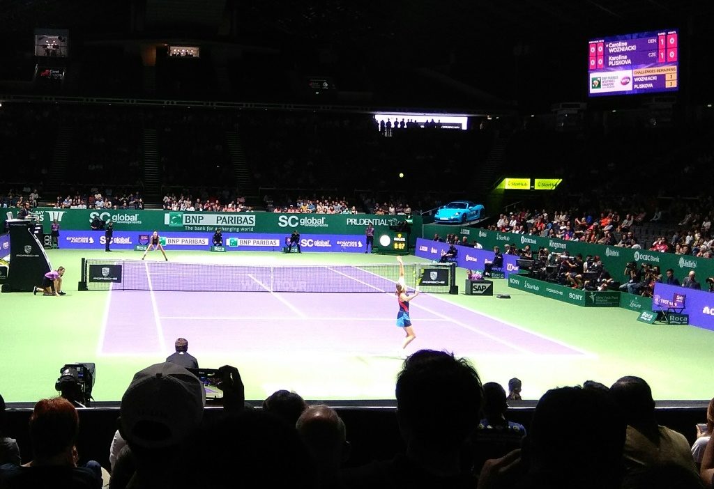 Caroline Wozniacki serving at the WTA Finals 2018 Singapore