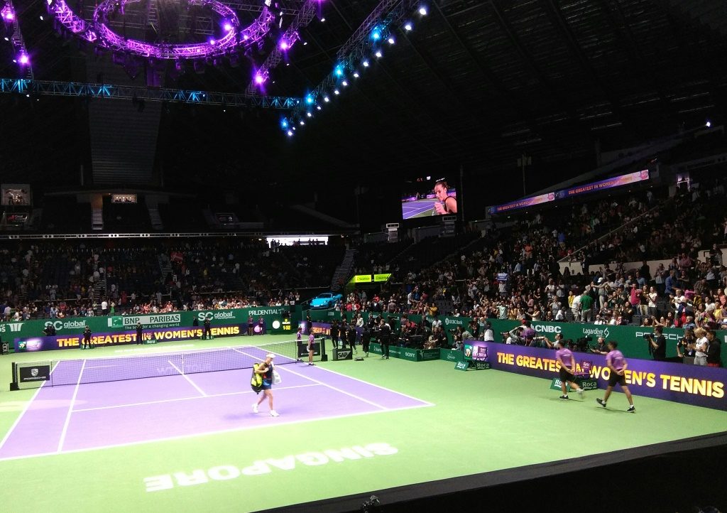 Caroline Wozniacki walking off centre court after losing 6-2.6-4 to Karolina Pliskova at WTA Finals 2018 Singapore