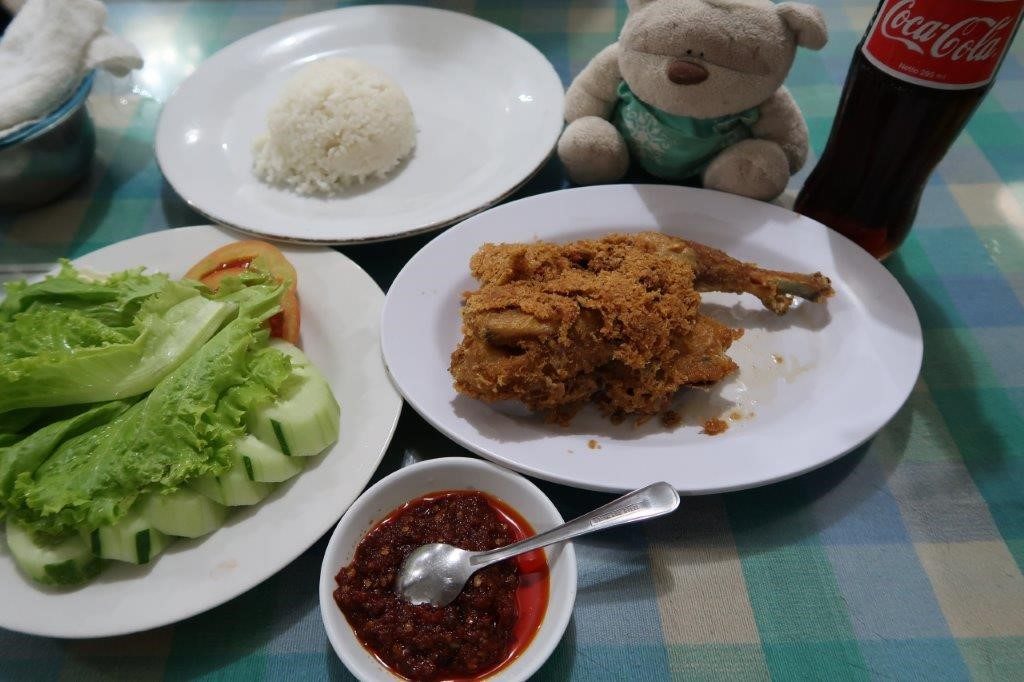 Fried Chicken with rice and vegetables for 100,500 IDR ($9 SGD)