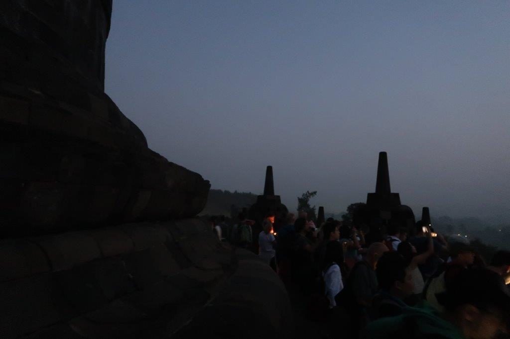Tourists gathered at Borobudur at twilight 