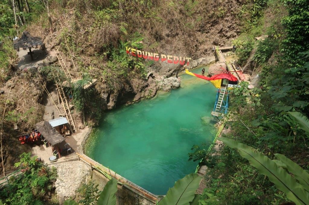Clear bluish green waters at Kedung Pedut Waterfall
