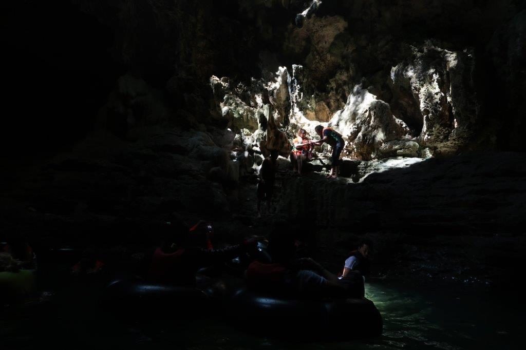 Edging closer to the opening inside Pindul Cave