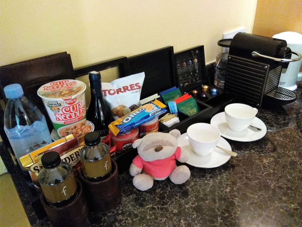 In-room amenities (including Nespresso) in Straits Club Heritage Room Fullerton Singapore Hotel