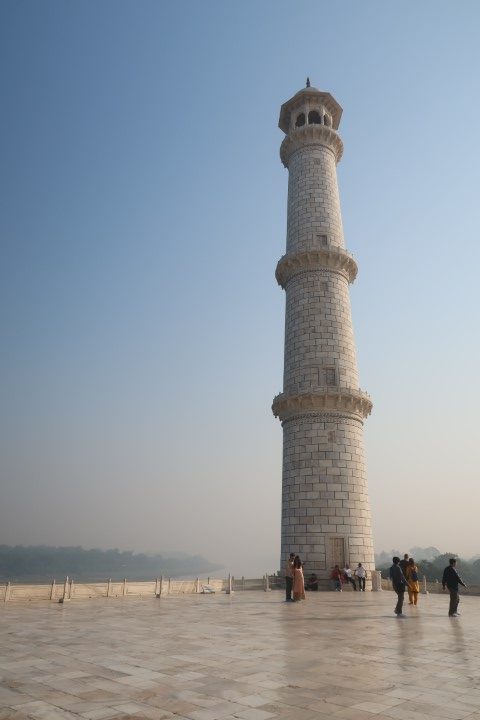 A Taj Mahal minaret next to the Yamuna River