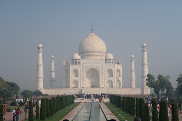 By now the Taj Mahal presents a majestic while colour in the bright morning sun