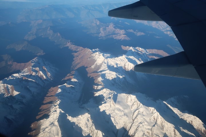 Flying over the snow-capped Himalayan Mountains