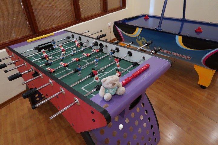 Futsal and air hockey in the games room of the Grand Dragon Ladakh Hotel Leh