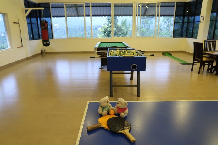 Games room with pool, table futsal and table tennis at The Leaf Munnar