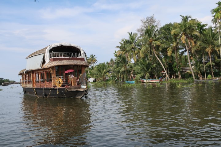 Two story boathouses along Kerala Backwaters Alleppey