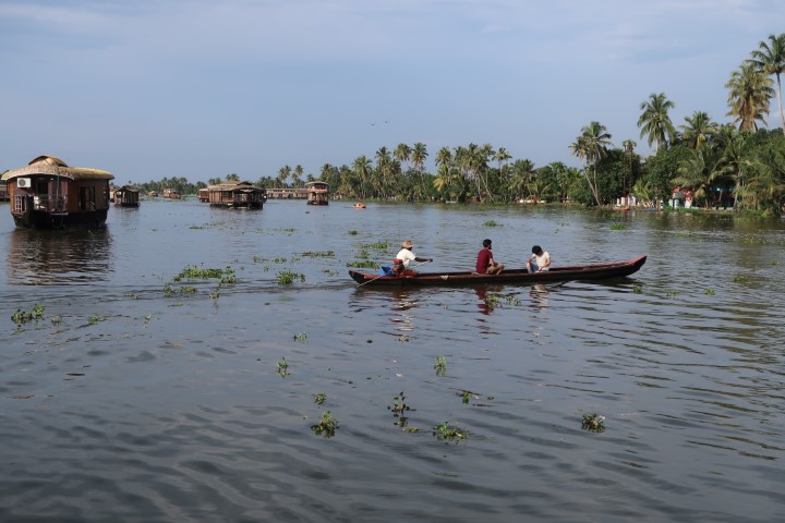 Villages in traditional boats along backwaters of Kerala
