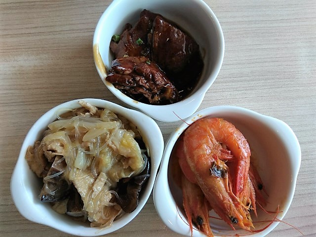 Clockwise from top: Braised duck, prawns and nonya chap chye (mixed vegetables)at Spice Brasserie Peranakan lunch buffet
