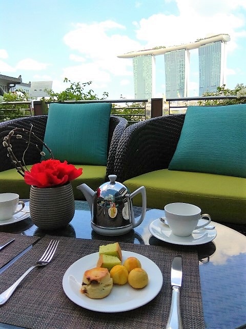 Views of the Marina Bay from the Fullerton Bay Hotel's afternoon tea on a leisurely afternoon