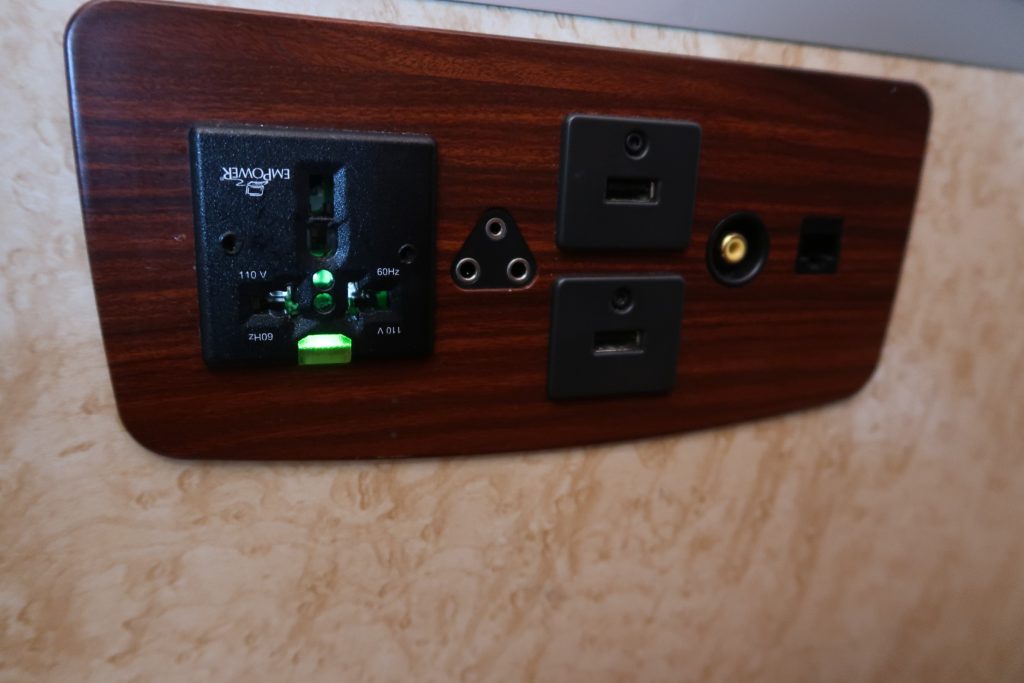 Multi-purpose power outlets and usb outlets onboard SQ First Class Suites 