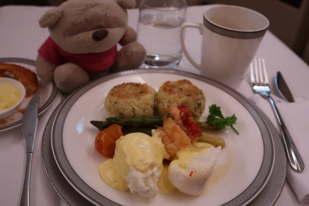 SQ First Class Suites Book The Cook - Poached Eggs served with Hollandaise Sauce (aka Eggs Benedict with Lobster Cakes!)