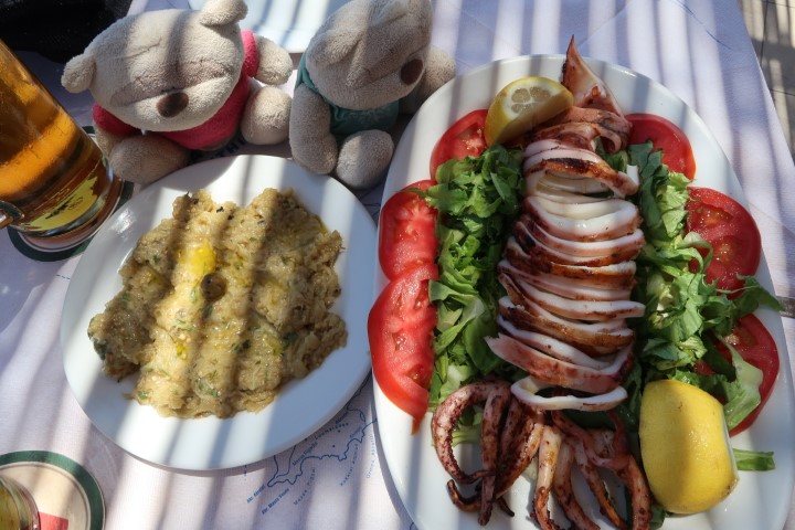 Eggplant salad (4.5 euros), Grilled Squid (13 euros) at Taverna Simos Restaurant Fira Santorini
