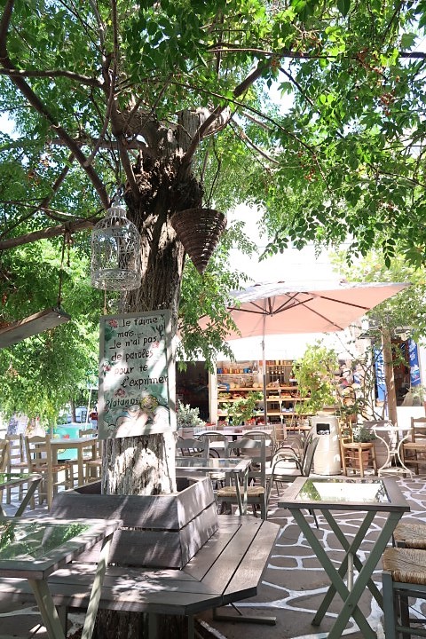 Chilling under a tree of a cafe in Filoti Village, Naxos