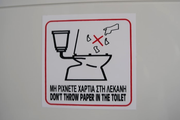 Common toilet sign (Not to Throw Paper into Toilet) that we see all across Greece
