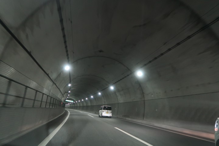 Driving in tunnels through mountainous areas in Okinawa enroute to Henza Island