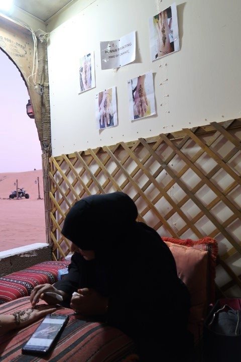 Henna art during Dubai desert tour before dinner...