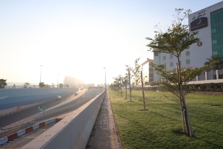 Path next to Premier Inn Dubai International Airport Hotel that leads to the Emirates Station next to the freeway