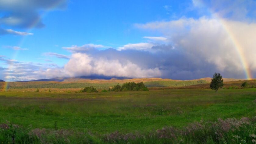 Complete rainbow in the fields off Skotel Alpine Resort NZ