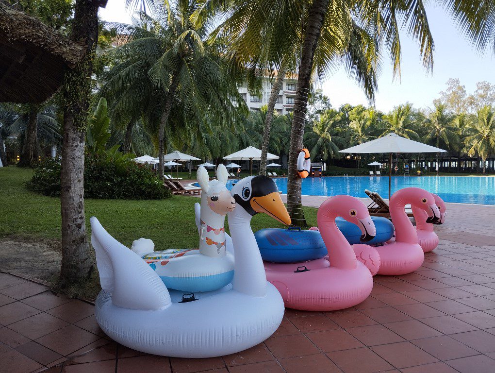 Flamingo, Swan and even an alpaca float at Vinpearl Resort & Spa Phu Quoc Swimming Pool