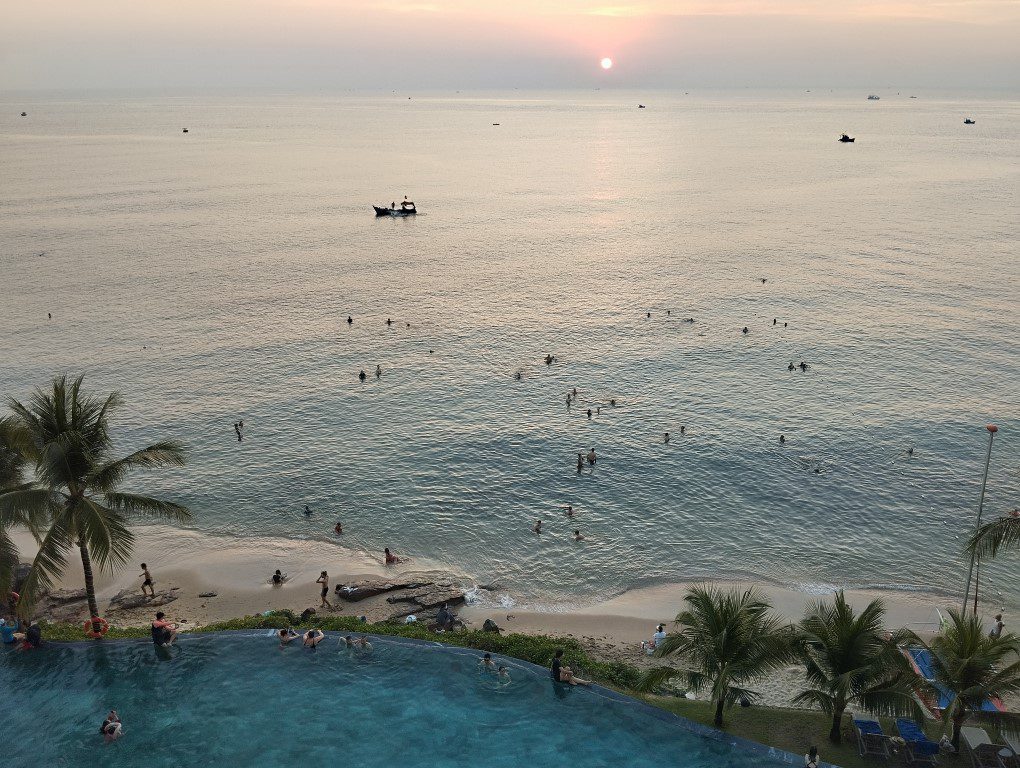 Sunset as seen from Seashells Phu Quoc Hotel & Spa from our Premium Ocean View Room - Lots of People Catching Sunset as well!