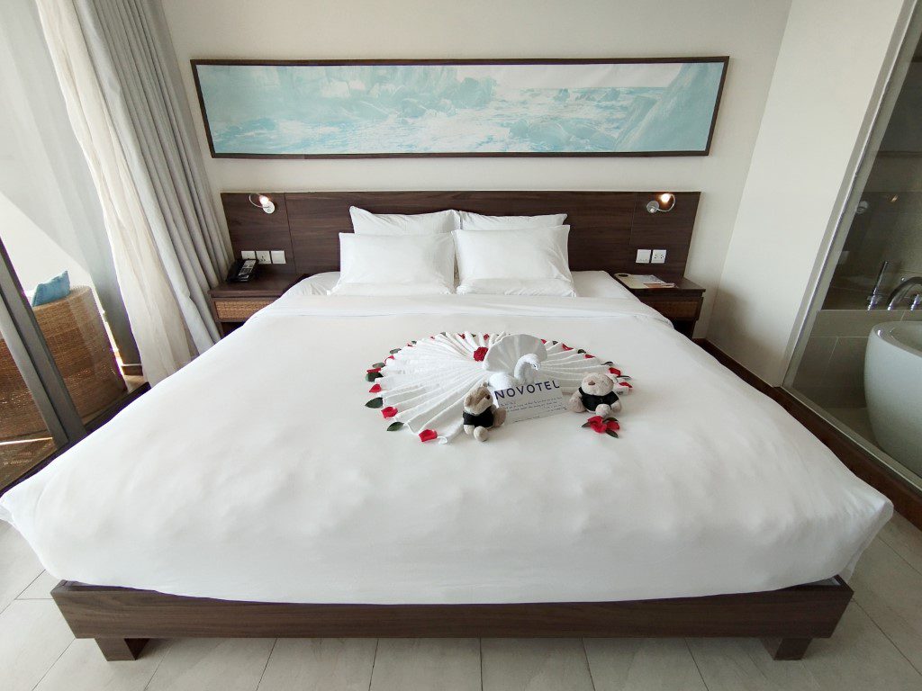 Peacock towel art on bed of Superior Suite at Novotel Phu Quoc Resort!