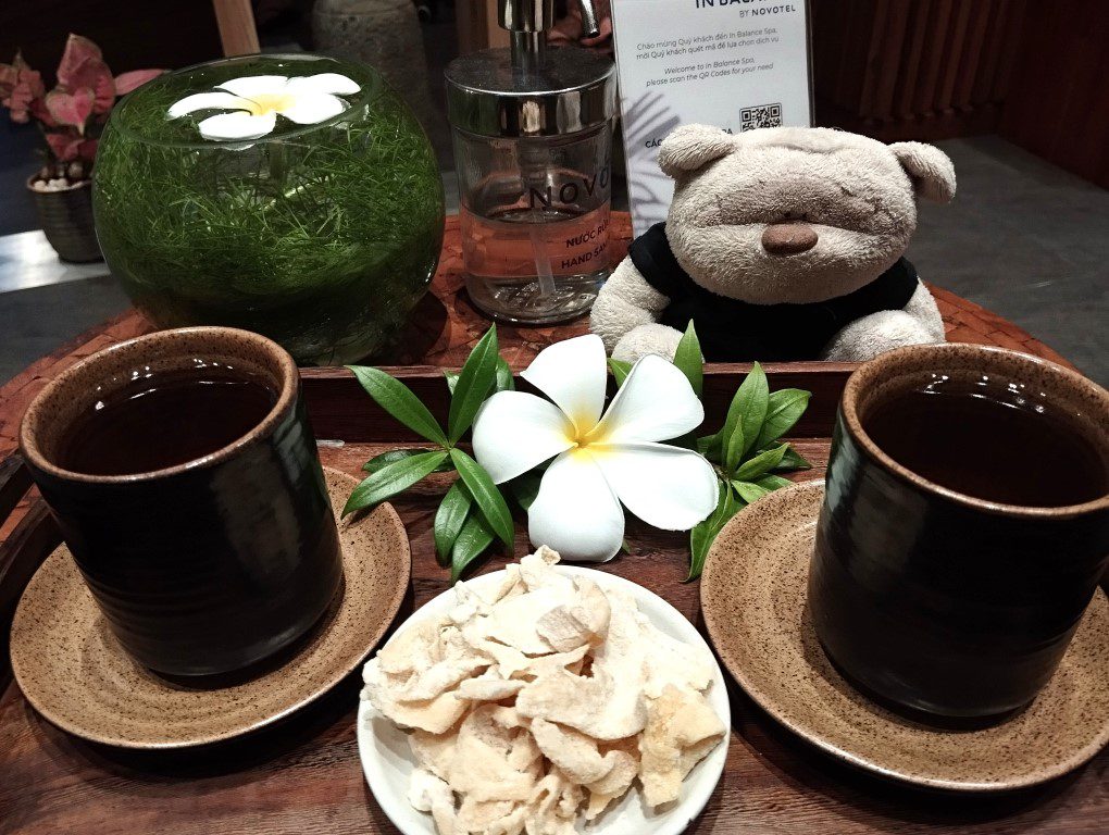 Hot tea and ginger sweets at end of treatment at In Balance Spa Novotel Phu Quoc Resort