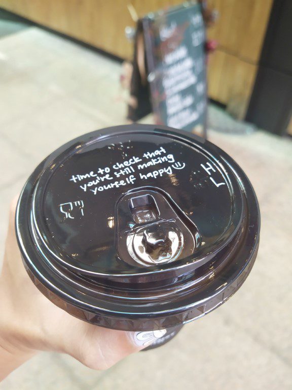 Optimist Coffee KL - Spreading Positivity through phrases like "Time to check that you're still making yourself happy :)"