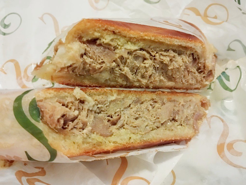 Pan Con Lechon ($11.99 - Pork, pickled mojo, onions and garlic cilantro aioli) from Sanguich de Miami Little Havana