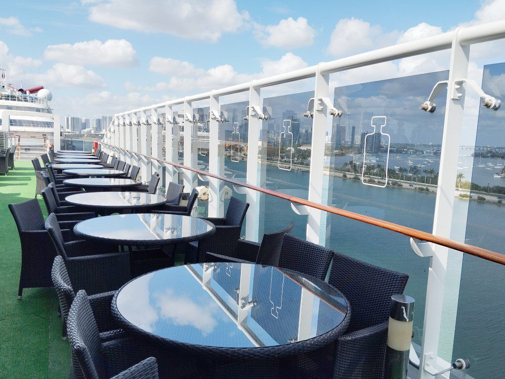 MSC Divina Deck 15 - Disaronno Temporary Terrace Tables with Views of Miami Port