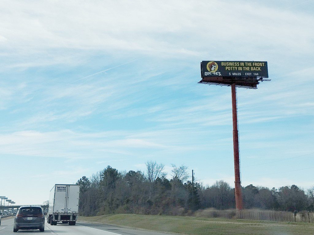 Buc-ee's Sign (Florida) that read "Business in the front. Potty in the back." - 5 Miles away