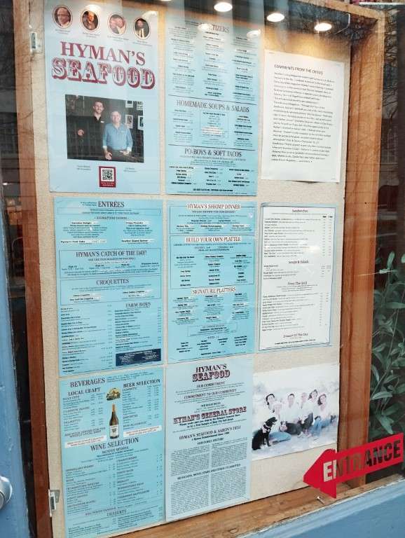 Hyman's Seafood Menu outside its restaurant in Charleston