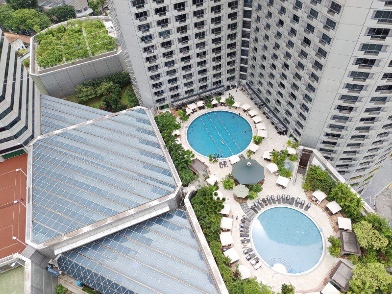 View of the swimming pools from Swissotel The Stamford Signature Suite